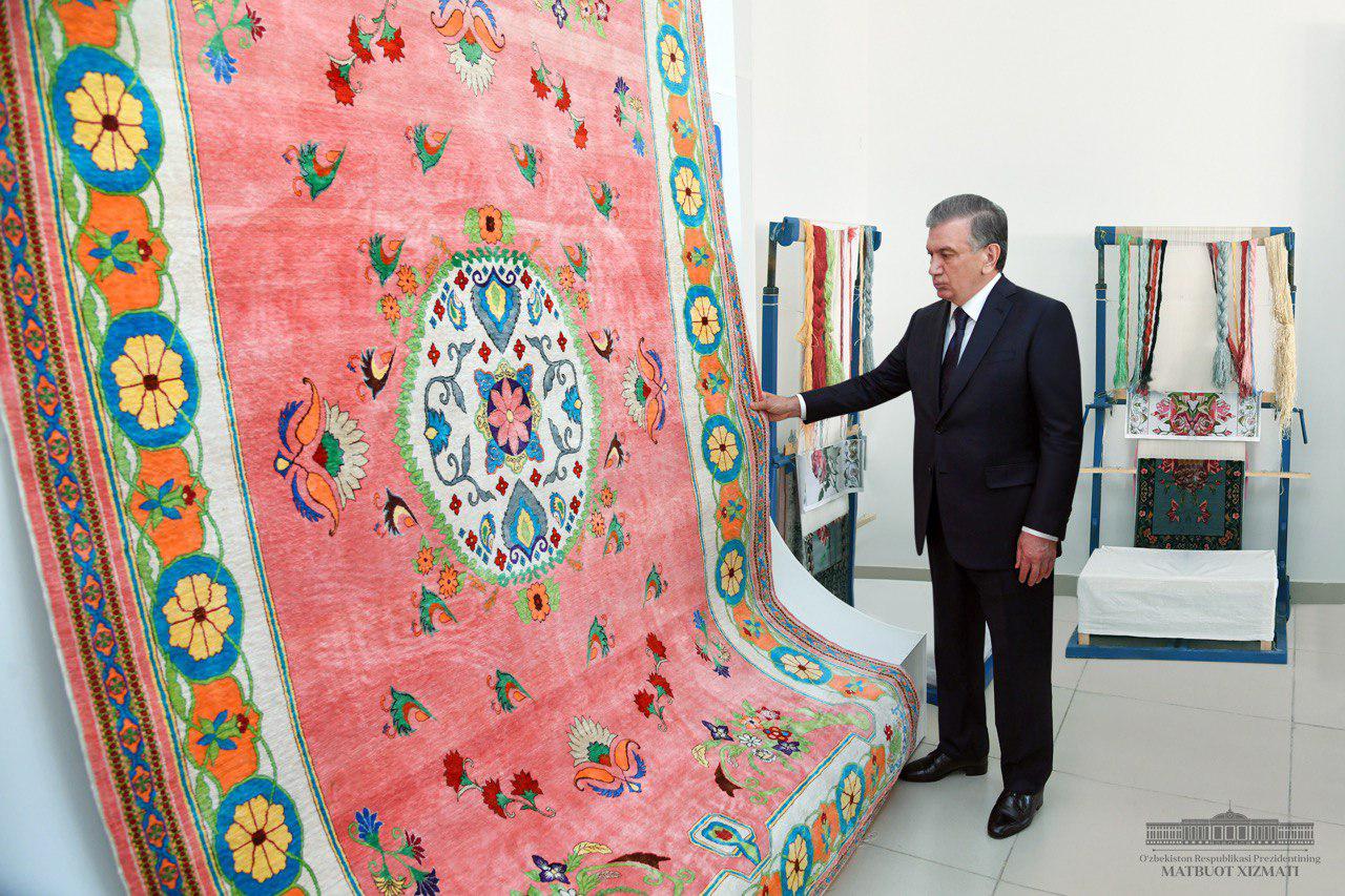 Shavkat Mirziyoyev gets a first-hand view of the silk-spinning enterprise